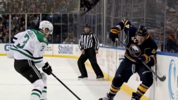 Nov 17, 2015; Buffalo, NY, USA; Dallas Stars defenseman John Klingberg (3) knocks the puck away from Buffalo Sabres left wing Nicolas Deslauriers (44) during the second period at First Niagara Center. Mandatory Credit: Timothy T. Ludwig-USA TODAY Sports