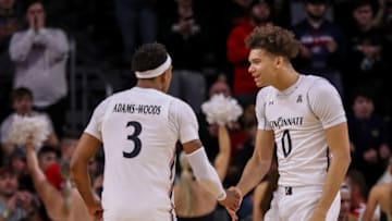 Cincinnati Bearcats guards Mika Adams-Woods and Daniel Skillings Jr at Fifth Third Arena. USA Today.