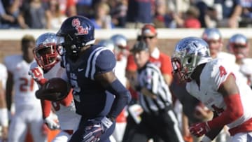 Sep 12, 2015; Oxford, MS, USA; Mississippi Rebels defensive back Tee Shepard (2) carries the ball back against Fresno State Bulldogs wide receiver Keyan Williams (4) after intercepting the ball at Vaught-Hemingway Stadium. Mississippi Rebels beat Fresno State Bulldogs 73 - 21. Mandatory Credit: Justin Ford-USA TODAY Sports
