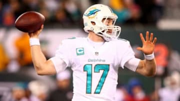 Dec 1, 2014; East Rutherford, NJ, USA; Miami Dolphins quarterback Ryan Tannehill (17) drops back to pass against the New York Jets during the second quarter of a game at MetLife Stadium. Mandatory Credit: Brad Penner-USA TODAY Sports