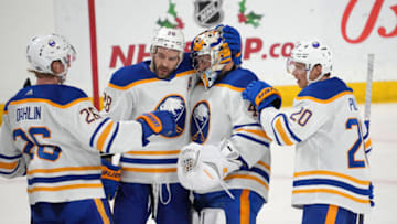 Dec 17, 2022; Tempe, Arizona, USA; Buffalo Sabres players celebrate a victory over the Arizona Coyotes after their game at Mullett Arena. Mandatory Credit: Joe Camporeale-USA TODAY Sports