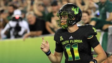 TAMPA, FL - OCTOBER 20: Blake Barnett #11 of the South Florida Bulls celebrates a touchdown during a game against the Connecticut Huskies at Raymond James Stadium on October 20, 2018 in Tampa, Florida. (Photo by Mike Ehrmann/Getty Images)