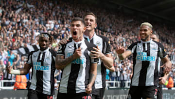 Bruno Guimaraes of Newcastle United celebrates scoring with teammates Allan Saint-Maximin, Chris Wood and Joelinton against Leicester City. (Photo by Visionhaus/Getty Images)