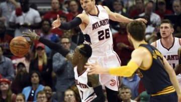 May 20, 2015; Atlanta, GA, USA; Atlanta Hawks guard Dennis Schroder (17) and guard Kyle Korver (26) go for a rebound against Cleveland Cavaliers guard Matthew Dellavedova (right) during the fourth quarter of game one of the Eastern Conference Finals of the NBA Playoffs at Philips Arena. Mandatory Credit: Dale Zanine-USA TODAY Sports