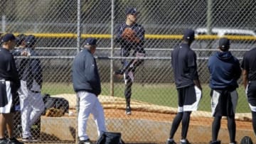 Feb 19, 2015; Tampa, FL, USA; New York Yankees starting pitcher Masahiro Tanaka (19) throws a bullpen session at New York Yankees minor league complex. Mandatory Credit: Kim Klement-USA TODAY Sports