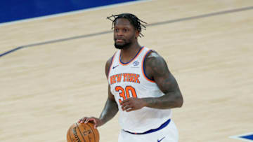 NEW YORK, NEW YORK - APRIL 20: Julius Randle #30 of the New York Knicks dribbles during the second half against the Charlotte Hornets at Madison Square Garden on April 20, 2021 in New York City. NOTE TO USER: User expressly acknowledges and agrees that, by downloading and or using this photograph, User is consenting to the terms and conditions of the Getty Images License Agreement. (Photo by Sarah Stier/Getty Images)