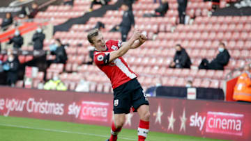SOUTHAMPTON, ENGLAND - NOVEMBER 29: James Ward-Prowse of Southampton scores from a free-kick to make it 2-0 and celebrates during the Premier League match between Southampton and Manchester United at St Mary's Stadium on November 29, 2020 in Southampton, England. Sporting stadiums around the UK remain under strict restrictions due to the Coronavirus Pandemic as Government social distancing laws prohibit fans inside venues resulting in games being played behind closed doors. (Photo by Robin Jones/Getty Images)