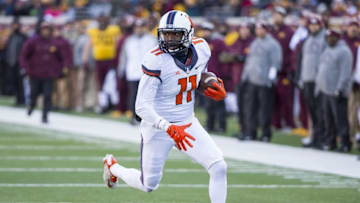 Nov 21, 2015; Minneapolis, MN, USA; Illinois Fighting Illini wide receiver Malik Turner (11) rushes with the ball after making a catch in the first half against the Illinois Fighting Illini at TCF Bank Stadium. Mandatory Credit: Jesse Johnson-USA TODAY Sports