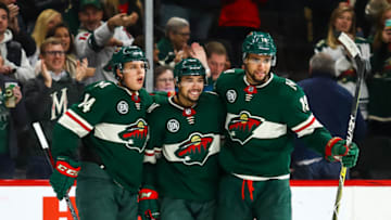 ST. PAUL, MN - NOVEMBER 21: Minnesota Wild defenseman Matt Dumba (24), center, smiles after scoring his 2nd goal in the 2nd period during the game between the Ottawa Senators and the Minnesota Wild on November 21, 2018 at Xcel Energy Center in St. Paul, Minnesota. (Photo by David Berding/Icon Sportswire via Getty Images)