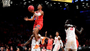 NEW YORK, NEW YORK - NOVEMBER 25: Isaac Okoro #23 of the Auburn Tigers jumps for a layup in the first half against the New Mexico Lobos at Barclays Center on November 25, 2019 in New York City. (Photo by Emilee Chinn/Getty Images)