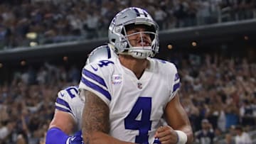 ARLINGTON, TX - OCTOBER 08: Dak Prescott #4 celebrates his touchdown run with Jason Witten #82 of the Dallas Cowboys in the fourth quarter against the Green Bay Packers at AT&T Stadium on October 8, 2017 in Arlington, Texas. (Photo by Ronald Martinez/Getty Images)