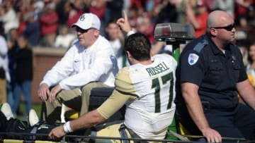 Nov 12, 2016; Norman, OK, USA; Baylor Bears quarterback Seth Russell (17) is carted off of the field after an injury in action against the Oklahoma Sooners during the third quarter at Gaylord Family - Oklahoma Memorial Stadium. Mandatory Credit: Mark D. Smith-USA TODAY Sports