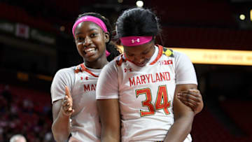 COLLEGE PARK, MD - FEBRUARY 01: Brianna Fraser #34 of the Maryland Terrapins celebrates with Kaila Charles #5 during the game against the Rutgers Scarlet Knights at Xfinity Center on February 1, 2018 in College Park, Maryland. (Photo by G Fiume/Maryland Terrapins/Getty Images)
