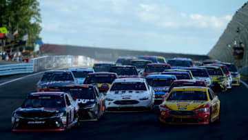WATKINS GLEN, NY - AUGUST 07: Denny Hamlin, driver of the #11 FedEx Freight Toyota, leads Martin Truex Jr., driver of the #78 Furniture Row Toyota, during the NASCAR Sprint Cup Series Cheez-It 355 at Watkins Glen International on August 7, 2016 in Watkins Glen, New York. (Photo by Sean Gardner/Getty Images)