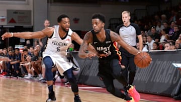 LAS VEGAS, NV - JULY 12: Daryl Macon #54 of the Miami Heat handles the ball against the New Orleans Pelicans during the 2018 Las Vegas Summer League on July 12, 2018 at the Cox Pavilion in Las Vegas, Nevada. NOTE TO USER: User expressly acknowledges and agrees that, by downloading and/or using this photograph, user is consenting to the terms and conditions of the Getty Images License Agreement. Mandatory Copyright Notice: Copyright 2018 NBAE (Photo by David Dow/NBAE via Getty Images)