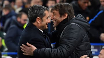 Barcelona's Spanish manager Ernesto Valverde (L) and Chelsea's Italian head coach Antonio Conte greet before the first leg of the UEFA Champions League round of 16 football match between Chelsea and Barcelona at Stamford Bridge stadium in London on February 20, 2018. / AFP PHOTO / Ben STANSALL (Photo credit should read BEN STANSALL/AFP via Getty Images)