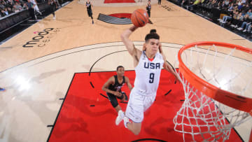 PORTLAND, OR - APRIL 7: Michael Porter Jr. #9 of the USA Junior Select Team dunks against the World Select Team during the game on April 7, 2017 at the MODA Center Arena in Portland, Oregon. NOTE TO USER: User expressly acknowledges and agrees that, by downloading and or using this photograph, User is consenting to the terms and conditions of License Agreement. Mandatory Copyright Notice: Copyright 2017 NBAE (Photo by Sam Forencich)