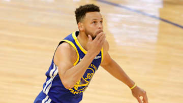 SAN FRANCISCO, CALIFORNIA - APRIL 12: Stephen Curry #30 of the Golden State Warriors reacts after he made a basket to pass Wilt Chamberlain as the Golden State Warriors all-time leading scorer during the first quarter of their game against the Denver Nuggets at Chase Center on April 12, 2021 in San Francisco, California. NOTE TO USER: User expressly acknowledges and agrees that, by downloading and or using this photograph, User is consenting to the terms and conditions of the Getty Images License Agreement. (Photo by Ezra Shaw/Getty Images)