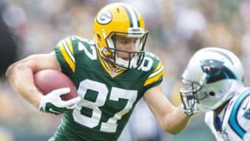 Oct 19, 2014; Green Bay, WI, USA; Green Bay Packers wide receiver Jordy Nelson (87) rushes for a touchdown after catching a pass during the first quarter against the Carolina Panthers at Lambeau Field. Mandatory Credit: Jeff Hanisch-USA TODAY Sports