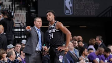 SACRAMENTO, CA - FEBRUARY 2: Head coach Dave Joerger of the Sacramento Kings coaches Buddy Hield #24 against the Philadelphia 76ers on February 2, 2019 at Golden 1 Center in Sacramento, California. NOTE TO USER: User expressly acknowledges and agrees that, by downloading and or using this photograph, User is consenting to the terms and conditions of the Getty Images Agreement. Mandatory Copyright Notice: Copyright 2019 NBAE (Photo by Rocky Widner/NBAE via Getty Images)