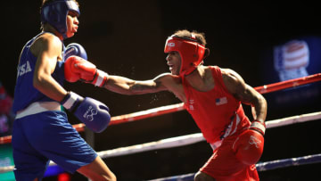 LAKE CHARLES, LOUISIANA - DECEMBER 15: Delante Johnson fight s Freudis Rojas during the 2020 U.S. Olympic Boxing Team Trials at Golden Nugget Lake Charles Hotel & Casino on December 15, 2019 in Lake Charles, Louisiana. (Photo by Chris Graythen/Getty Images)
