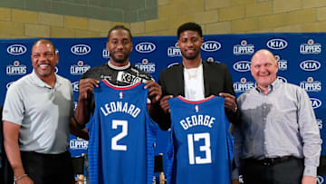OKC Thunder trade of Paul George. LAC intro with Doc Rivers, Paul George, Kawhi Leonard and owner Steve Ballmer (Photo by Kevork Djansezian/Getty Images)