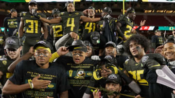 SANTA CLARA, CALIFORNIA - DECEMBER 06: Oregon Ducks players celebrate after the Ducks defeated the Utah Utes 37-15 in the Pac-12 Championship Game at Levi's Stadium on December 06, 2019 in Santa Clara, California. (Photo by Thearon W. Henderson/Getty Images)