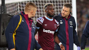 LONDON, ENGLAND - SEPTEMBER 08: Maxwel Cornet of West Ham is treated for an injury during the UEFA Europa Conference League group B match between West Ham United and FCSB at London Stadium on September 8, 2022 in London, United Kingdom. (Photo by Marc Atkins/Getty Images)