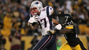 Oct 23, 2016; Pittsburgh, PA, USA; New England Patriots tight end Rob Gronkowski (87) scores a touchdown past Pittsburgh Steelers safety Robert Golden (21) during the second half at Heinz Field. The Patriots won the game, 27-16. Mandatory Credit: Jason Bridge-USA TODAY Sports