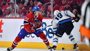 Arber Xhekaj #72, Montreal Canadiens; David Gustafsson #19, Winnipeg Jets. (Photo by Minas Panagiotakis/Getty Images)
