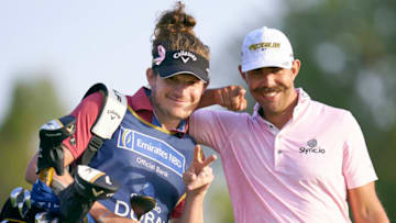Erik van Rooyen and caddie Alex Gaugert,Slync.io Dubai Desert Classic,(Photo by Pedro Salado/Quality Sport Images/Getty Images)