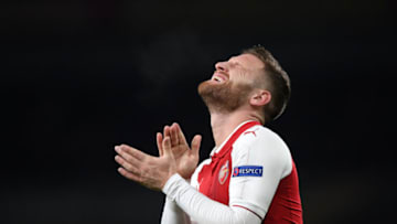 LONDON, ENGLAND - MARCH 15: Shkodran Mustafi of Arsenal reacts during the UEFA Europa League Round of 16 Second Leg match between Arsenal and AC Milan at Emirates Stadium on March 15, 2018 in London, England. (Photo by Shaun Botterill/Getty Images)