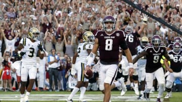 Sep 3, 2016; College Station, TX, USA; Texas A&M Aggies quarterback Trevor Knight (8) goes in for the one-yard touchdown run in overtime against the UCLA Bruins. Texas A&M won 31-24. Mandatory Credit: Ray Carlin-USA TODAY Sports