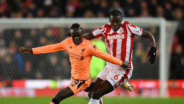 STOKE ON TRENT, ENGLAND - NOVEMBER 29: Kurt Zouma of Stoke City is challenged by Sadio Mane of Liverpool during the Premier League match between Stoke City and Liverpool at Bet365 Stadium on November 29, 2017 in Stoke on Trent, England. (Photo by Gareth Copley/Getty Images)