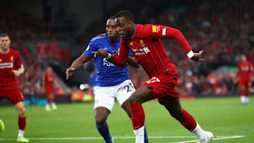 LIVERPOOL, ENGLAND - OCTOBER 05: Divock Origi of Liverpool battles for possession with Ricardo Pereira of Leicester City during the Premier League match between Liverpool FC and Leicester City at Anfield on October 05, 2019 in Liverpool, United Kingdom. (Photo by Clive Brunskill/Getty Images)