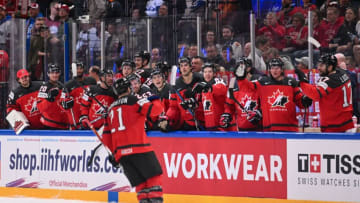 Canada's forward Scott Laughton (C) celebrates the team's fourth goal during the IIHF Ice Hockey Men's World Championship semi-final match between Canada and Latvia in Tampere, Finland on May 27, 2023. (Photo by Jonathan NACKSTRAND / AFP) (Photo by JONATHAN NACKSTRAND/AFP via Getty Images)