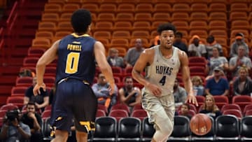 Dec 10, 2016; Miami, FL, USA; Georgetown Hoyas guard Jagan Mosely (4) dribbles the ball against La Salle Explorers guard Pookie Powell (0) during the first half at American Airlines Arena. Mandatory Credit: Steve Mitchell-USA TODAY Sports