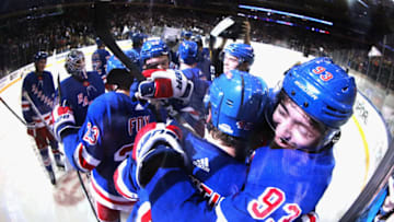 NEW YORK, NEW YORK - MARCH 05: Brendan Lemieux #48 and Mika Zibanejad #93 of the New York Rangers celebrate a 5-4 overtime victory over the Washington Capitals at Madison Square Garden on March 05, 2020 in New York City. (Photo by Bruce Bennett/Getty Images)