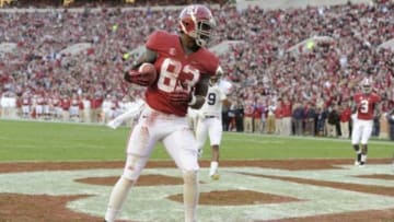 November 24, 2012; Tuscaloosa, AL, USA; Alabama Crimson Tide wide receiver Kevin Norwood (83) pulls in a touchdown pass in the endzone against the Auburn Tigers during the second quarter at Bryant Denny Stadium. Mandatory Credit: John David Mercer-USA TODAY Sports