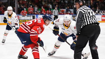 OSHAWA, ON - JANUARY 26: Philip Tomasino #26 of the Oshawa Generals and Evan Vierling #41 of the Barrie Colts take a face-off during an OHL game at the Tribute Communities Centre on January 26, 2020 in Oshawa, Ontario, Canada. (Photo by Chris Tanouye/Getty Images)
