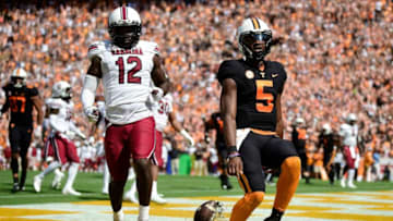 Tennessee quarterback Hendon Hooker (5) scores a touchdown in the end zone as South Carolina defensive back Jaylan Foster (12) during an NCAA college football game between the Tennessee Volunteers and the South Carolina Gamecocks in Knoxville, Tenn. on Saturday, Oct. 9, 2021.Kns Tennessee South Carolina Football