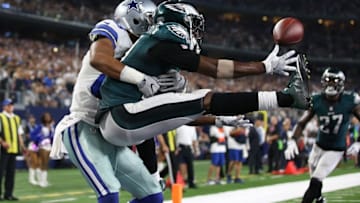 Oct 30, 2016; Arlington, TX, USA; Philadelphia Eagles cornerback Leodis McKelvin (21) can not make the catch for an interception against Dallas Cowboys receiver Terrance Williams (82) in the third quarter at AT&T Stadium. Williams was called for offensive pass interference on the play. Mandatory Credit: Matthew Emmons-USA TODAY Sports