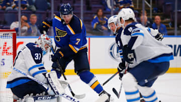 ST. LOUIS, MO - OCTOBER 4: Connor Hellebuyck #37 of the Winnipeg Jets makes a save against Patrick Maroon #7 of the St. Louis Blues at the Enterprise Center on October 4, 2018 in St. Louis, Missouri. (Photo by Dilip Vishwanat/Getty Images)