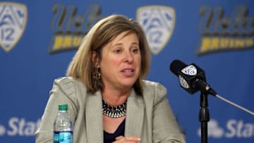 LOS ANGELES, CA - DECEMBER 30: Head coach Cori Close of the UCLA Bruins speaks to the media during the post-game press conference after the game against the USC Trojans at Pauley Pavilion on December 30, 2013 in Los Angeles, California. (Photo by Jeff Golden/Getty Images)