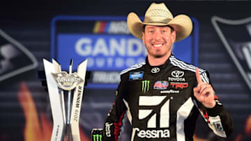 FORT WORTH, TX - MARCH 29: Kyle Busch, driver of the #51 Cessna Toyota, poses with the trophy after winning the NASCAR Gander Outdoors Truck Series Vankor 350 at Texas Motor Speedway on March 29, 2019 in Fort Worth, Texas. (Photo by Jared C. Tilton/Getty Images)