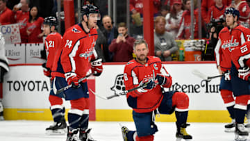 WASHINGTON, DC - FEBRUARY 04: Capitals left wing Alexander Alex Ovechkin (8) taps the cup of defenseman John Carlson (74) with his stick as part of a pregame ritual during warm ups before the Los Angeles Kings vs. Washington Capitals NHL game on February 4, 2020 at Capital One Arena in Washington, D.C.. (Photo by Randy Litzinger/Icon Sportswire via Getty Images)