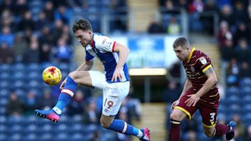 BLACKBURN, ENGLAND - FEBRUARY 04: Sam Gallagher of Blackburn Rovers controls the ball from Jake Bidwell of Queens Park Rangers during the Sky Bet Championship match between Blackburn Rovers and Queens Park Rangers at Ewood Park on February 4, 2017 in Blackburn, England. (Photo by Jan Kruger/Getty Images)