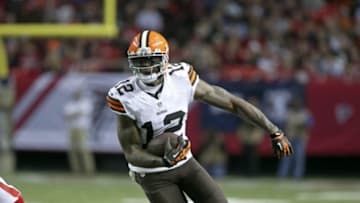 Nov 23, 2014; Atlanta, GA, USA; Cleveland Browns wide receiver Josh Gordon (12) runs after a catch in the fourth quarter of their game against the Atlanta Falcons at the Georgia Dome. The Browns won 26-24. Mandatory Credit: Jason Getz-USA TODAY Sports