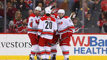 Nov 8, 2016; Newark, NJ, USA; The Carolina Hurricanes celebrate a goal by center Jordan Staal (11) during the second period of their game against the New Jersey Devils at Prudential Center. Mandatory Credit: Ed Mulholland-USA TODAY Sports