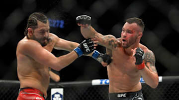 LAS VEGAS, NEVADA - MARCH 05: Colby Covington (R) punches Jorge Masvidal in their welterweight fight during UFC 272 at T-Mobile Arena on March 05, 2022 in Las Vegas, Nevada. (Photo by David Becker/Getty Images)